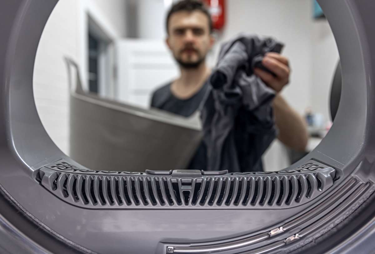 Kitchen sink gurgling noise caused by washing machine drain