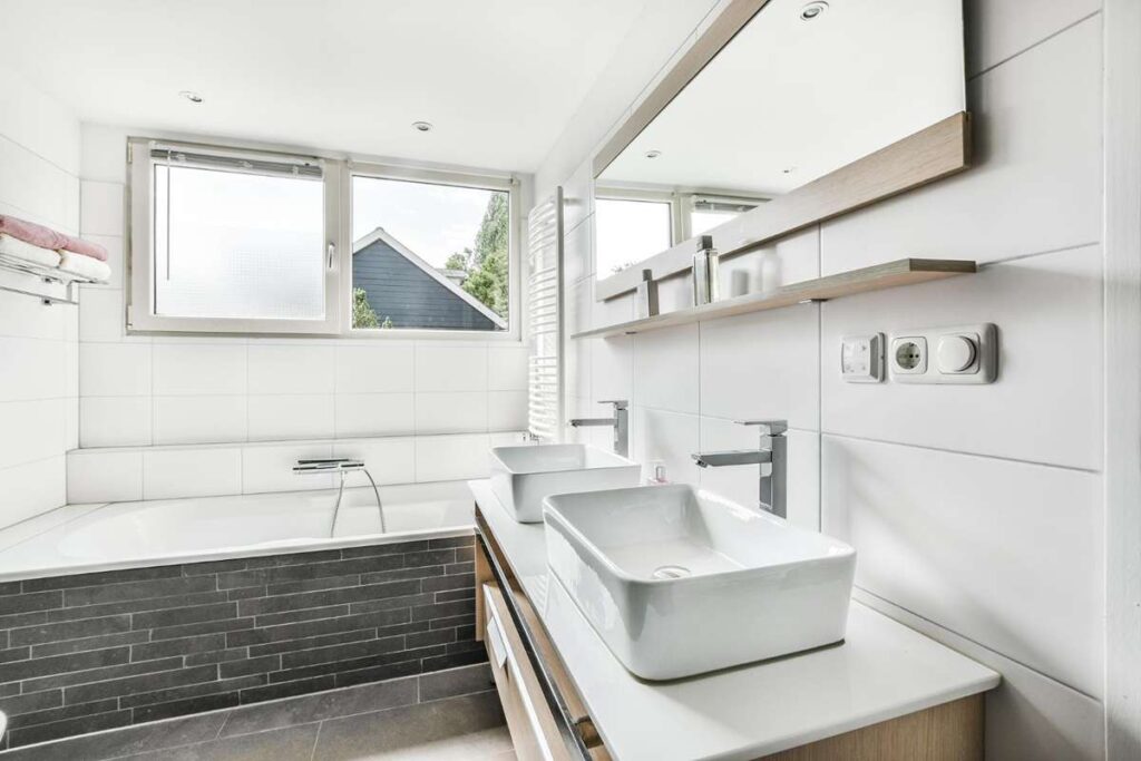 Small trough sink with 2 faucets ideal for compact spaces