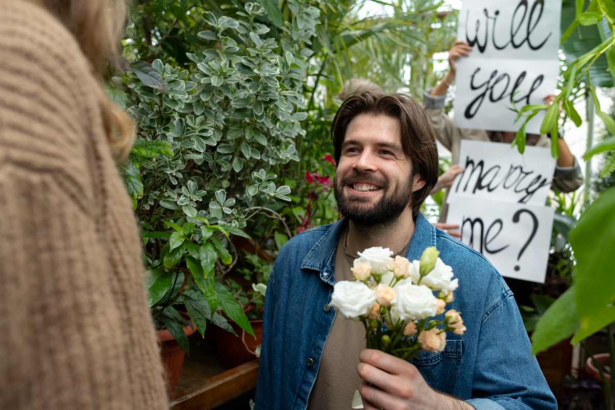Outdoor wedding ceremony with floral arch and garden décor